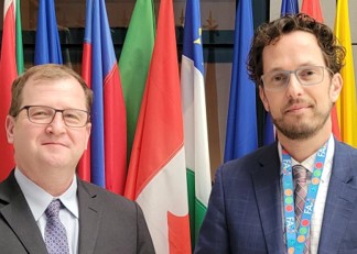 Donald Boucher of Canada (right) - pictured next to Seth Meyer of the United States.